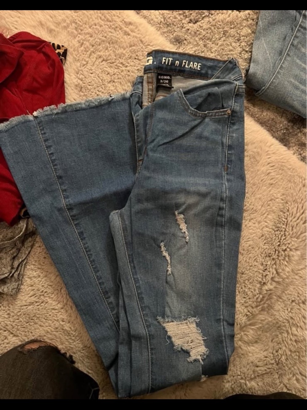 Women's Distressed Blue Jeans